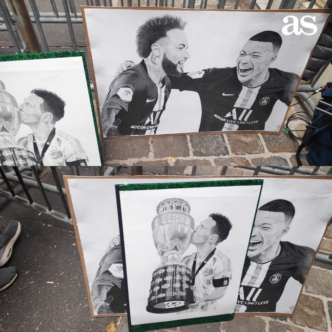 巴黎入住酒店外，球迷展示为梅西、内马尔、姆巴佩制作的图画